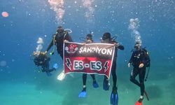Eskişehirspor taraftarlarından denizin 26 metre altında şampiyonluk kutlaması