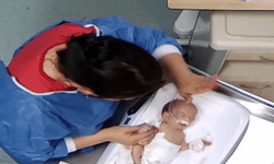 5 günlük bebeği döverek engelli bırakmıştı: Hemşire Afyon'da polise teslim oldu