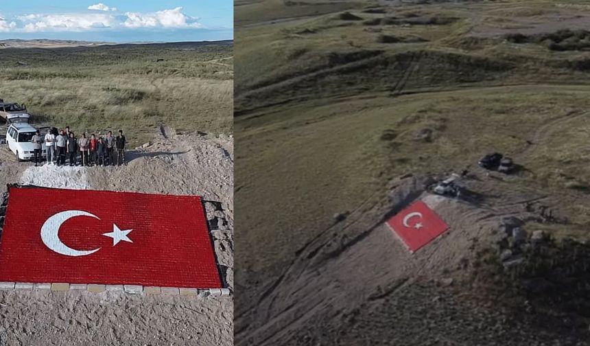 Eskişehir'de gençler 450 rakımlı tepeye dev Türk Bayrağı yaptı