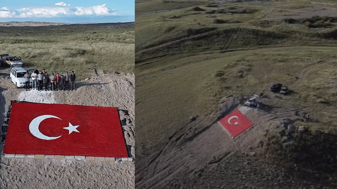 Eskişehir'de gençler 450 rakımlı tepeye dev Türk Bayrağı yaptı